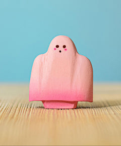 Bumbu handmade and hand painted wooden pink ghost figure available at Babipur.