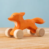 Bumbu handmade and hand painted rolling fox available at Babipur. Features wheels as feet for the figure to be used as a push and pull toy. 