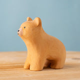 Bumbu handmade and hand painted wooden brown curious bear figure with playful and cute facial features available at Babipur.