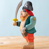 Bumbu handmade and hand painted pirate wooden figure available at Babipur showing the movable arm and hand painted detail