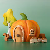 Bumbu handmade and hand painted wooden orange pumpkin house with other Bumbu woodland inspired figures including hedgehogs, a squirrel and a birch tree set available at Babipur.