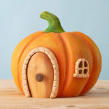 Bumbu handmade and hand painted wooden orange pumpkin house available at Babipur. Features a cute window and a removable door.