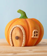 Bumbu handmade and hand painted wooden orange pumpkin house available at Babipur. Features a cute window and a removable door.