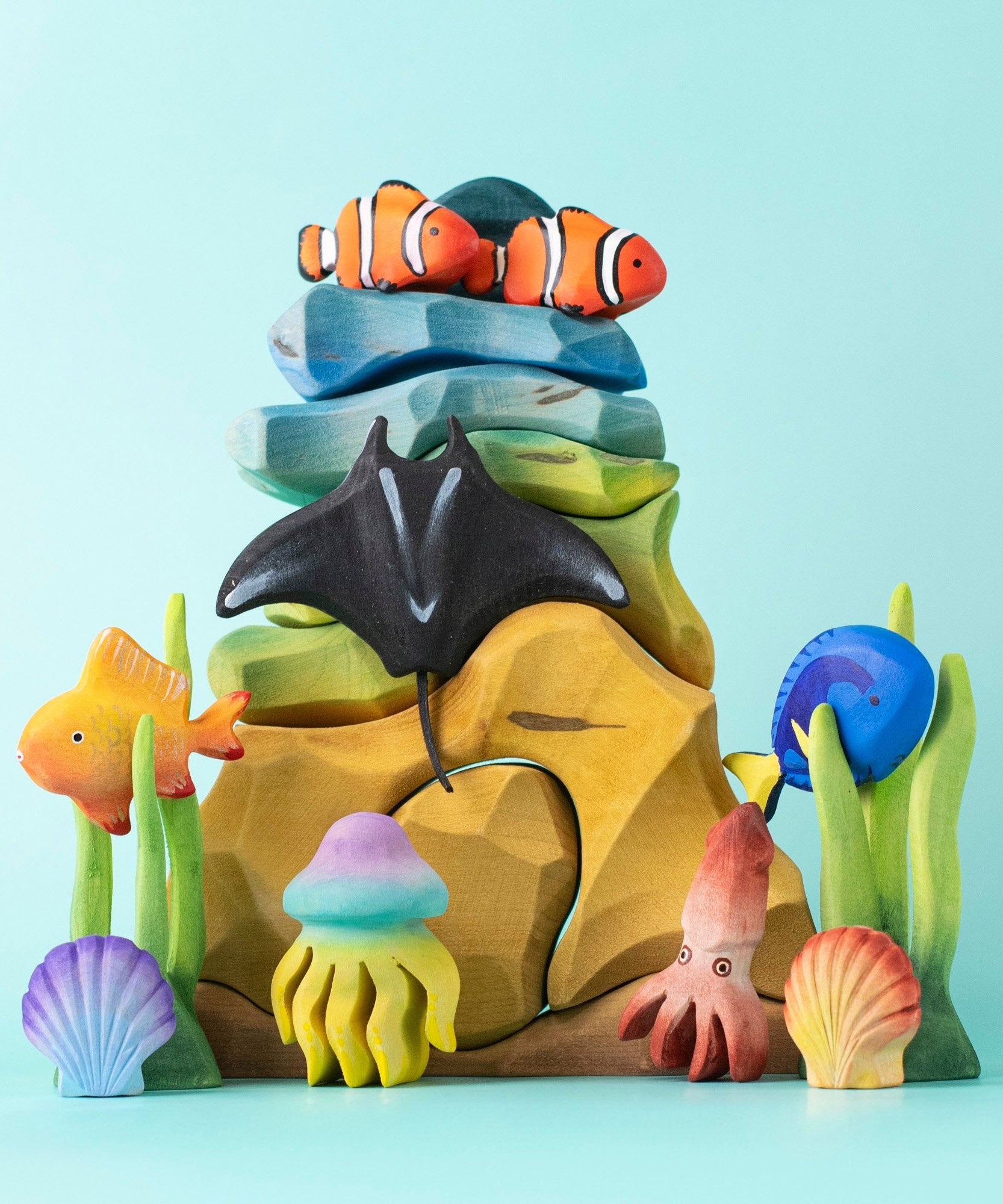 Bumbu handmade and hand painted wooden reef set available at Babipur with various Bumbu ocean themed animal figures. 