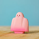 Bumbu handmade and hand painted wooden pink ghost figure with cute facial features available at Babipur.