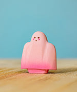 Bumbu handmade and hand painted wooden pink ghost figure with cute facial features available at Babipur.