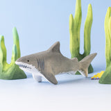 Bumbu handmade and hand painted wooden grey shark surrounded by the Bumbu green coral figures