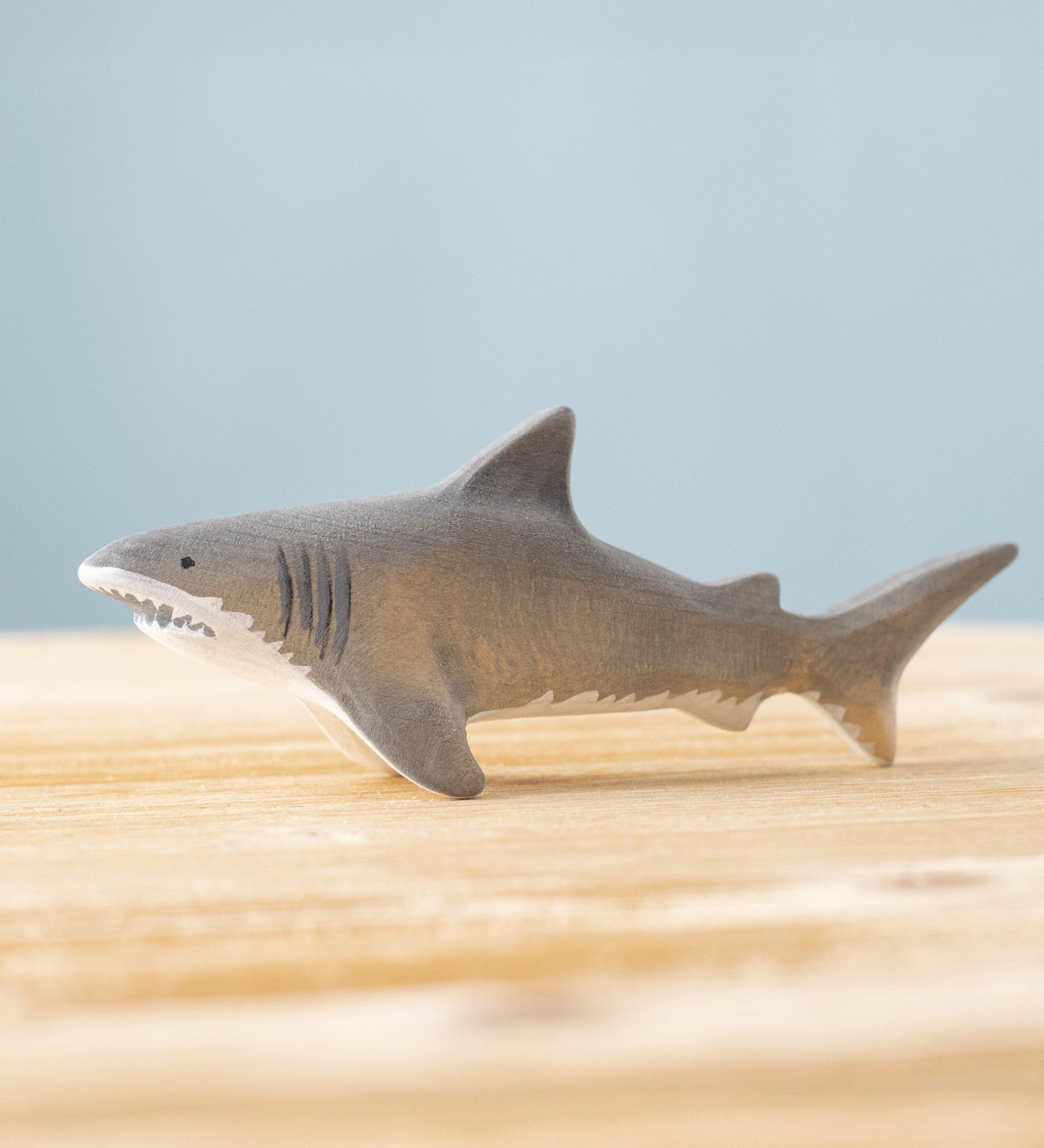 Bumbu handmade and hand painted wooden grey shark figure available at Babipur. 