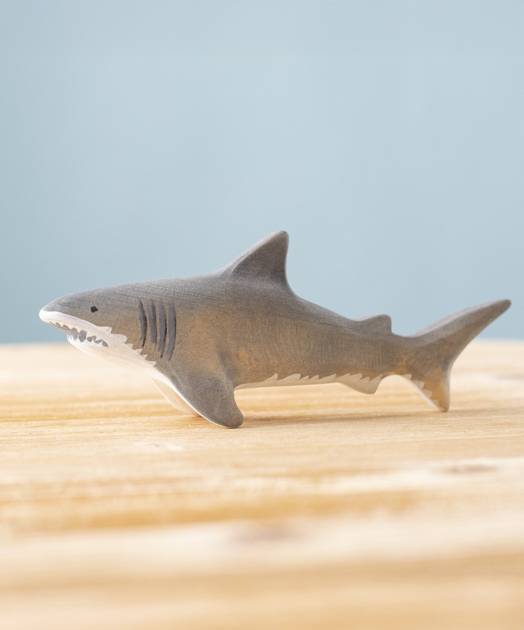 Bumbu handmade and hand painted wooden grey shark figure available at Babipur. 