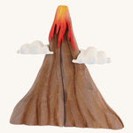 A Bumbu volcano wooden toy on a plain background.
