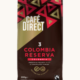 Red Aztec design 200g bag holding the Cafe direct fair trade Colombia Reserva ground coffee