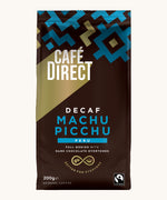Blue Aztec design 200g bag holding the Cafe direct fair trade Machu Picchu decaf ground coffee