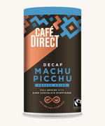 Blue Aztec design 100g tin holding the Cafe direct fair trade Machu Picchu decaf freeze dried ground coffee