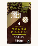 Green Aztec design 750g bag holding the Cafe direct fair trade Machu Picchu whole coffee beans