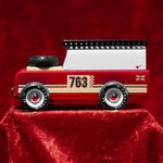 The Candylab Drifter Nigel from the side, on a red velvet background