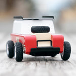 The front of the Candylab Drifter Nigel, showing the spare tire on the car bonnet, and the black detailing on the front of the car. The car is stood on a light wooden base