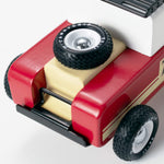 A top down view of the the front of the Candylab Drifter Nigel car, showing the tire and the wooden details