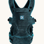The Carifit+ Fabric Baby Carrier in Coll Green, sown from the front on a cream background