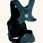 Th back of the Carifit+ Baby Carrier in Cool Green showing the supportive back panel, adjustable straps and zip up storage pouch, on a cream background