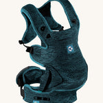 Carifit+ Fabric Baby Carrier in Cool Green shown from the side, showing the adjustable straps, on a cream background