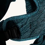 A closer look at the side strap on the Carifit+ Baby Carrier in Cool Green