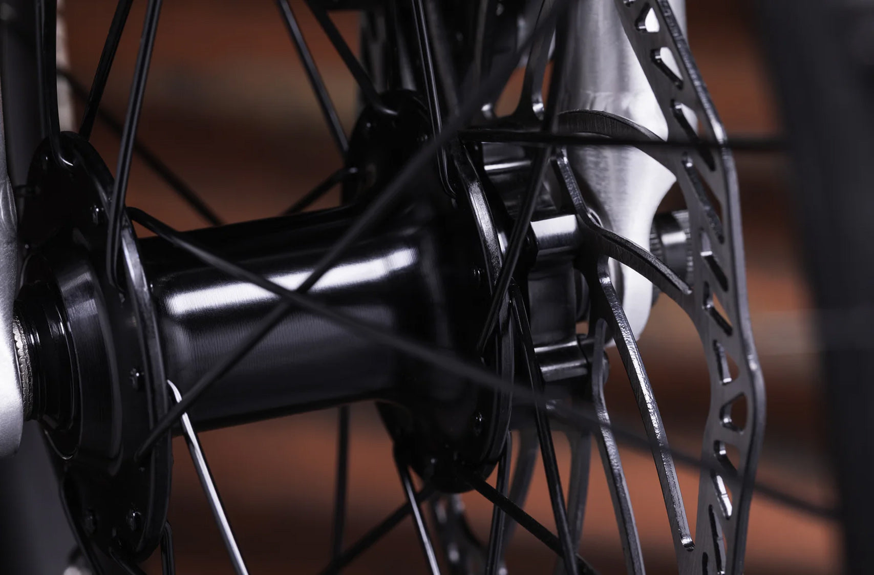 Close-up of a bicycle hub and disc brake system