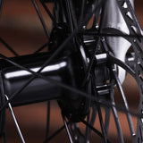 Close-up of a bicycle hub and disc brake system
