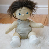 Olli Ella Dinkum Doll wearing a vest and pants from the sage pointelle PJ set, it also comes with a matching babygrow - for sale at Babipur.