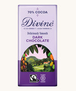 Front of Divine fairtrade 70% smooth dark chocolate bar in purple wrapping with a cocoa farm illustration 