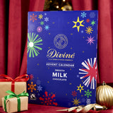 Divine fairtrade milk chocolate advent calendar available at Babipur. Showing the front of the calendar. Calendar is standing in a festive display.
