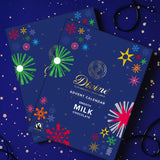 A pair of Divine fairtrade milk chocolate advent calendar available at Babipur. Showing the festive inspired design on the front with a matching festive background.