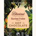 Front of Divine fairtrade luxury hot chocolate with hazelnut praline box shows a illustration of a cocoa farm