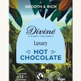 Front of Divine fairtrade luxury hot chocolate shows a illustration of a cocoa farm