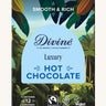 Front of Divine fairtrade luxury hot chocolate shows a illustration of a cocoa farm