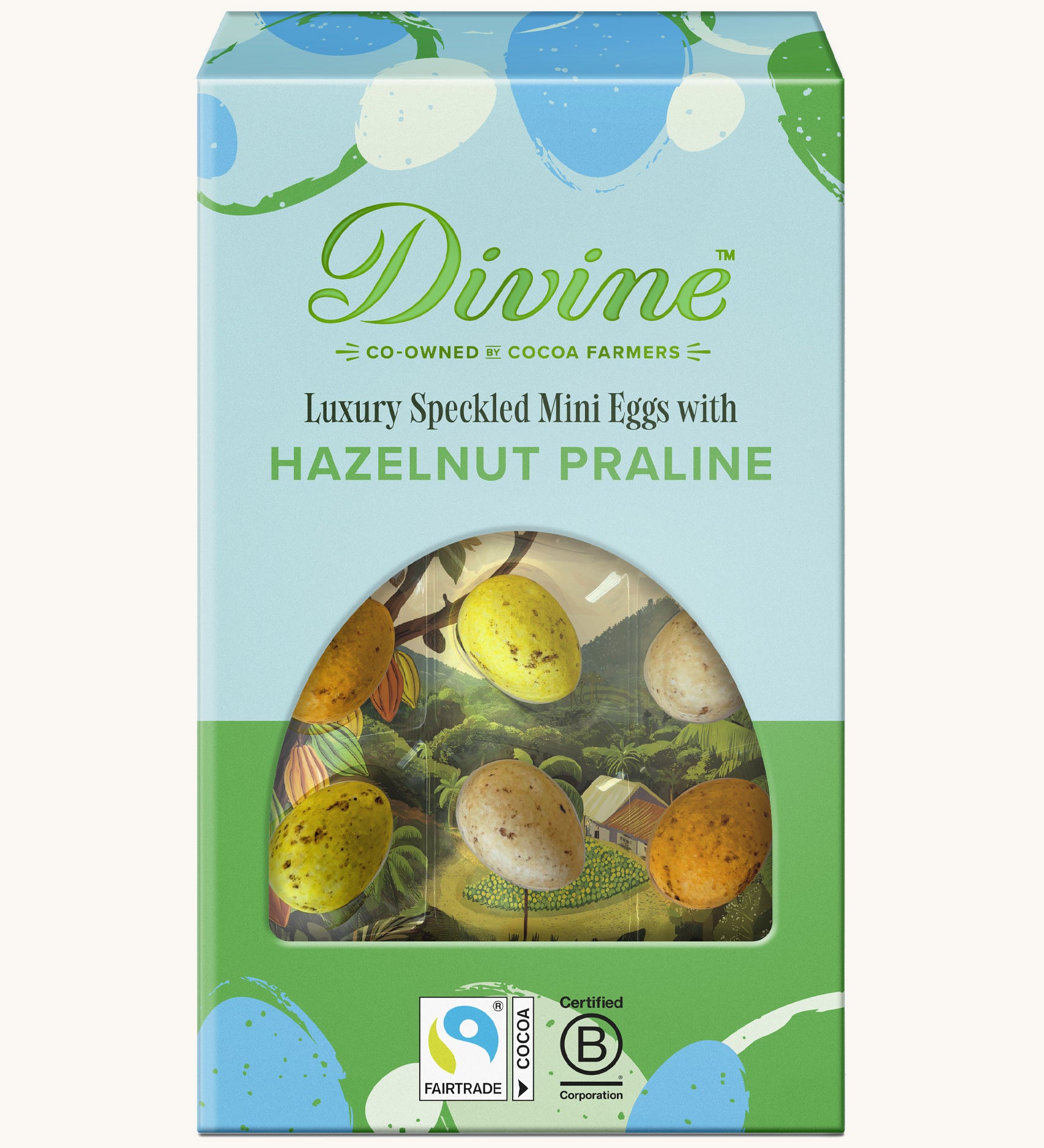 Divine Fairtrade milk chocolate mini eggs with hazelnut praline displayed in a decorated blue and green box