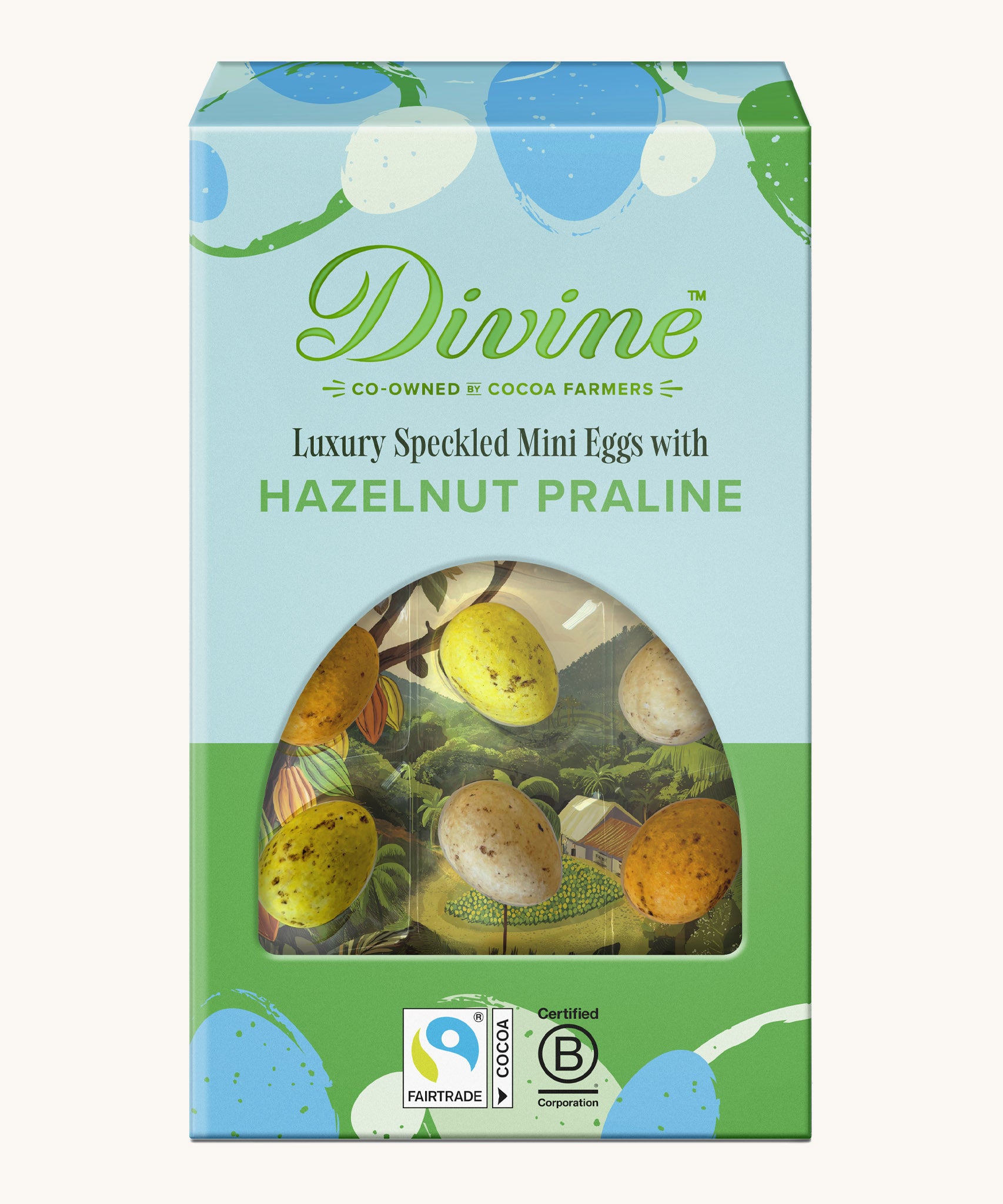 Divine Fairtrade milk chocolate mini eggs with hazelnut praline displayed in a decorated blue and green box