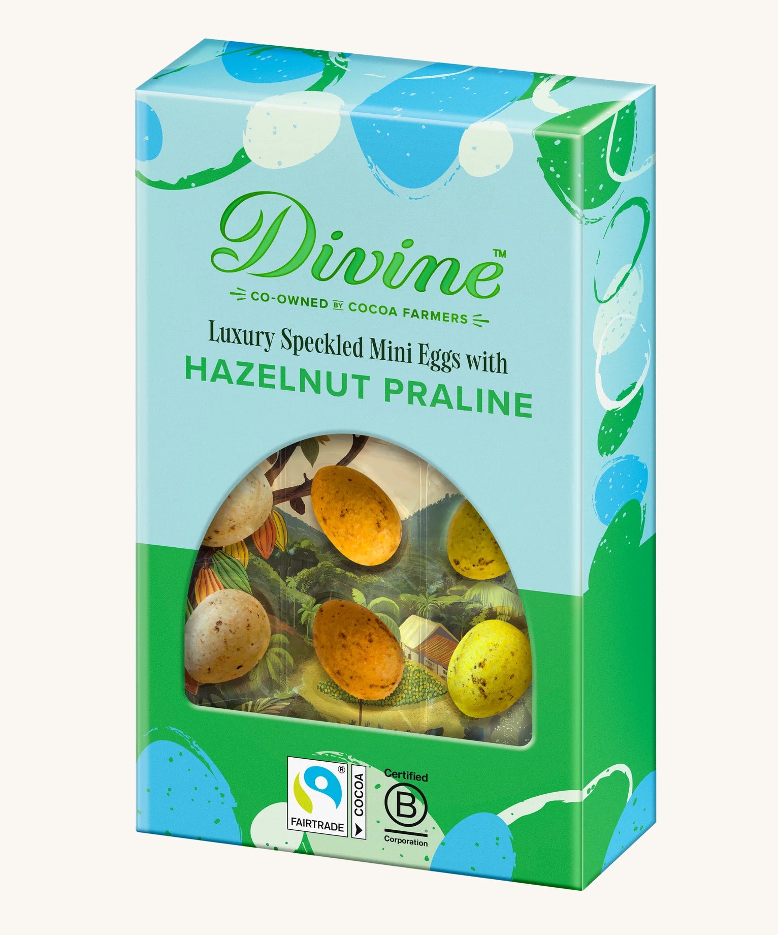Side of Divine Fairtrade milk chocolate mini eggs with hazelnut praline displayed in a decorated blue and green box