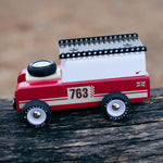 The Candylab Drifter Nigel on a wooden log, showing the car from the side