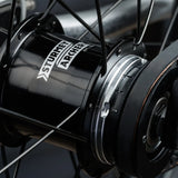 Close up of the Sturmey Archer automatic 2 geared hub on the back wheel of the Early Rider auto belter bike