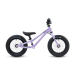 A side view of the Early Rider Charger Balance Bike - Violet Haze, showing the purple fame and the thickness of the black wheels 