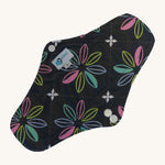 Earthwise reusable pad in charcoal with flowers print on black.