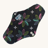 Earthwise reusable pad in charcoal with flowers print on black.