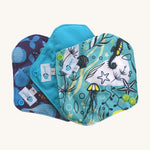 Three Earthwise Panty Liners in blue underwater prints.