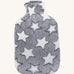 Ecoliving Natural Rubber Hot Water Bottle - Stella, has a super soft and snuggly plush cover in grey with a pattern of large white stars. The image is on a cream background