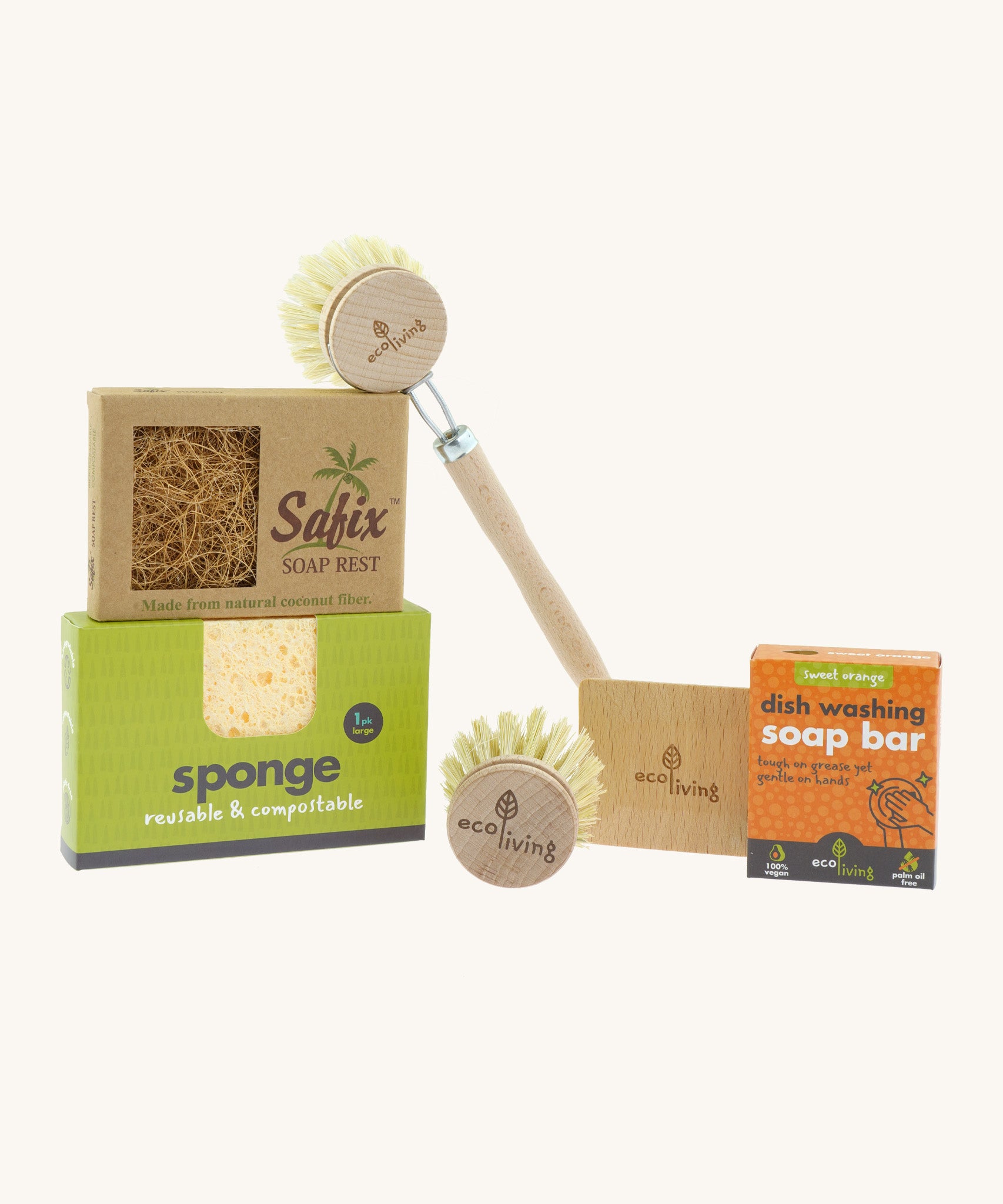 Eco Living washing up starter set available at Babipur including a coconut soap rest, a reusable sponge a wooden dish brush & replacement head, dish soap and a wooden pot scraper