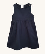 The Eco Outfitters organic and fair trade cotton school pinafore dress in navy.
