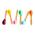 Eco Rascals Baby Spoons, lined up head to tail in 6 different silicone colours. 