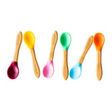 Eco Rascals Baby Spoons, lined up head to tail in 6 different silicone colours. 
