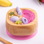 A pink and purple desert with fresh fruit in the Eco Rascals Bamboo Bowl & Spoon Weaning Set in pink silicone.