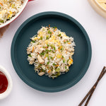 Eco Rascals Silicone Baby Plate in sivler without divider. with rice and vegetables.
